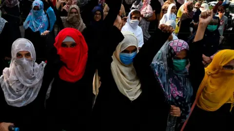 ARIF ALI Supporters of Pakistani Islamic political party Jamaat-e-Islami (JI) march during a protest against an alleged gang rape of a woman, in Lahore on September 17, 2020