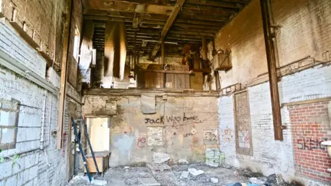 Dan Schumann Inside the derelict Spencer Mill