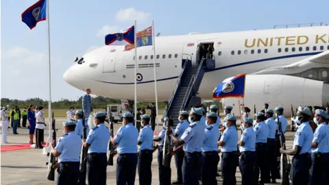 Reuters The royal couple received an official welcome on the first day of their tour of the Caribbean