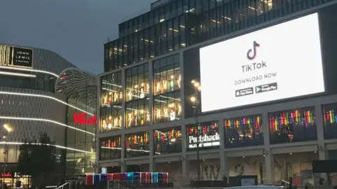 TikTok advert on Westfield shopping mall in west London