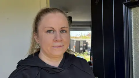 Naomi Lahiff in doorway