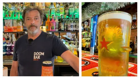 BBC / Josh Gorroño Chapman Dennis leans on the bar looking to the lens. He has greying hair and a beard. A second picture shows a pint of beer on the bar. Lines of brightly lit bottles line the walls behind.