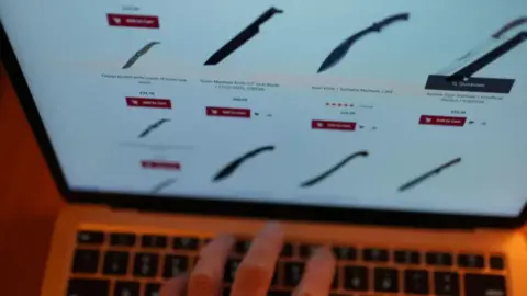A person searching online for ninja swords to purchase. 