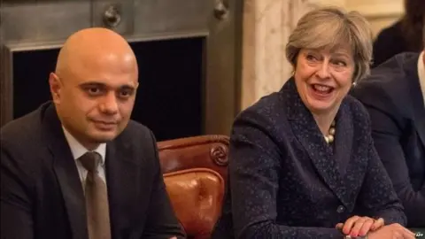 AFP Sajid Javid and Theresa May