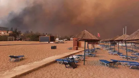 Rhodes fires: Chelmsford expat couple sleep on beach to escape fires