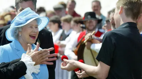 THE ROYAL FAMILY The Queen on the island in 2003