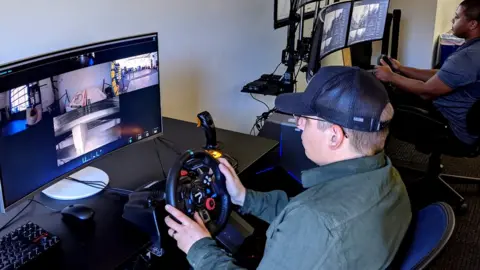 Phantom Auto Forkift trucks being remotely operated