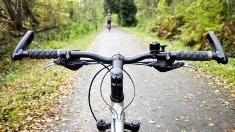 Getty Images Handlebars on cycle path