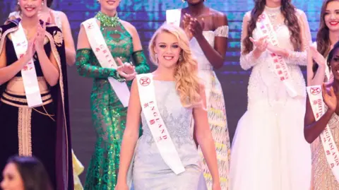 Stephanie Hill as Miss England. Here she is second runner-up at the Miss World 2017 competition. 