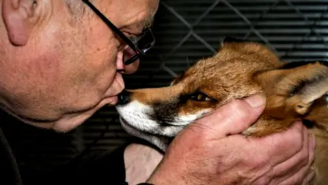 Geoff Grewcock Geoff Grewcock with a rescued fox