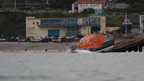 RNLI/Darren Wynne A lifeboat launching from Cromer's lifeboat house and slipway