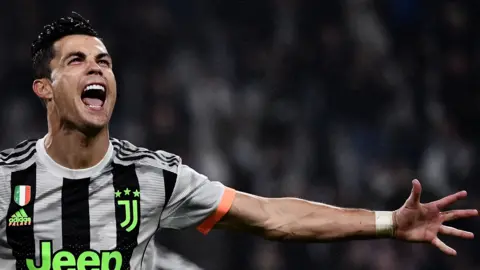 Cristiano Ronaldo celebrates late winner for Juventus