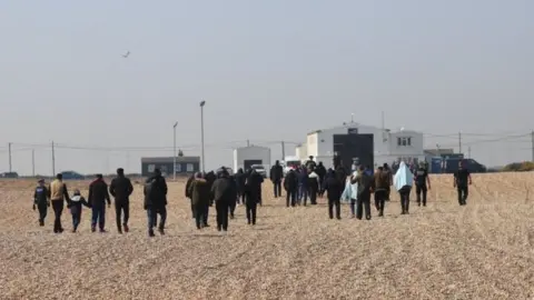 Migrants arriving in Dungeness Thursday.