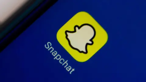 Getty Images Snapchat on a phone