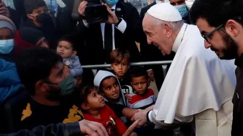 Reuters pope meets kids