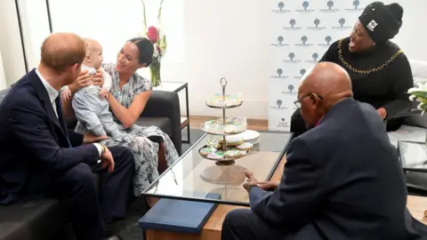 Reuters The Duke and Duchess of Sussex and their son Archie with Archbishop Desmond Tutu and his daughter Thandeka