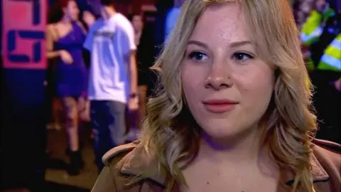 A woman outside a nightclub in Southampton