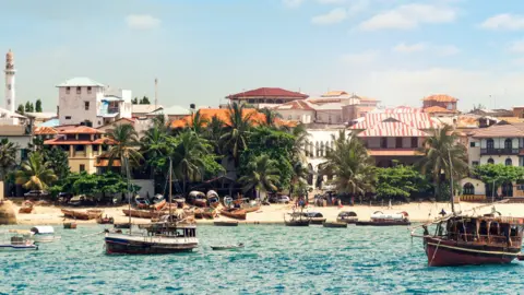 Getty Images Boat and beach of Zanzibar island, Tanzania
