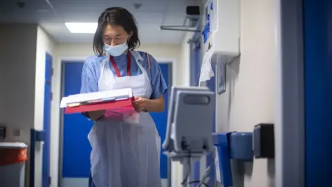 Getty Images Doctor at NHS Seacole Centre at Headley Court, Surrey, May 2020