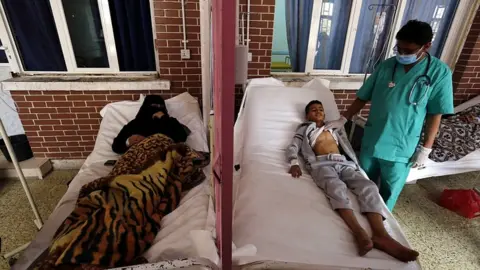 EPA People treated for cholera in Sanaa, Yemen. 14 May 2019