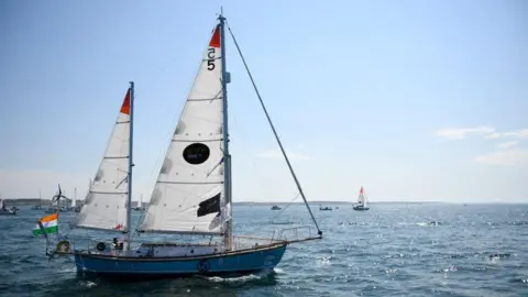 Getty Images Abhilash Tomy's Thuriya leaves Les Sables d'Olonne, France on 1 July 2018 at the start of the Golden Globe race