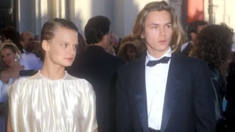 Barry King Martha Plimpton and River Phoenix arrive at the 1989 Oscars