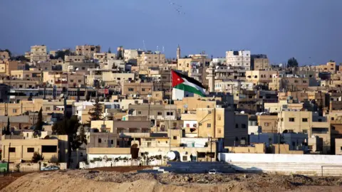 AFP File photo from 5 January 2010 showing the Jordanian city of Zarqa