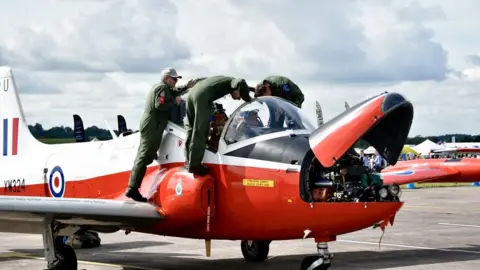 BBC Crew examining an aircraft