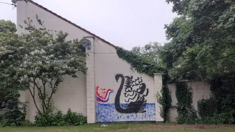 Alexandra Wells Swan mural on Milton Keynes home