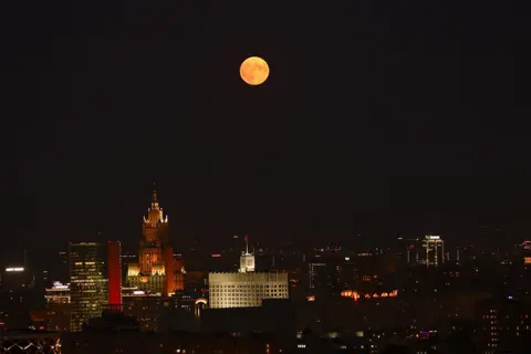  Sefa Karacan/Anadolu Agency via Getty Images The moon above Moscow