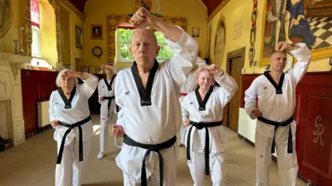 Carroll Weston/BBC Keith Harry and class