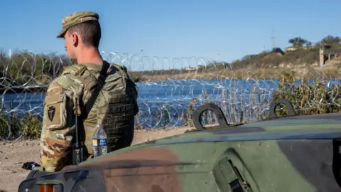 Border agent watches over Rio Grande