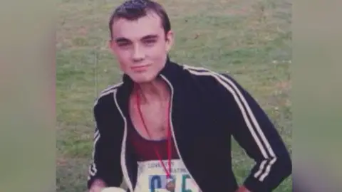 Steve Edwards Image of Steve Edwards at the age of 18 after his first marathon