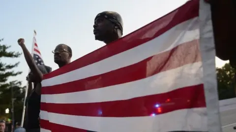 Getty Images Protesters in St Louis (15 September 2017)