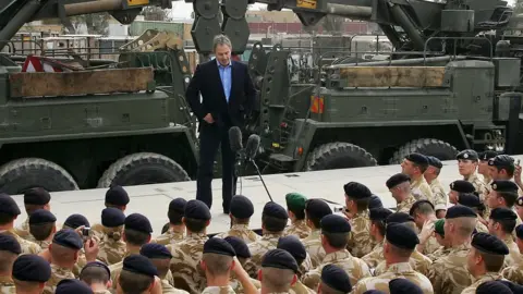AFP Tony Blair British addressing troops in Basra, Iraq, in 2005.