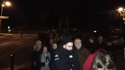 James Avrill/LDRS Residents queuing