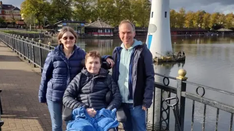 Family photo James, with his parents Alun and Janice