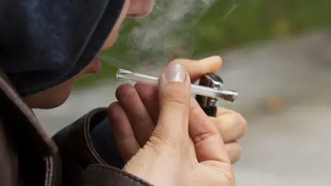 Thinkstock A man smoking drugs