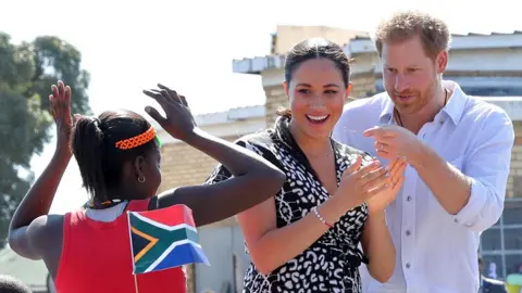 Getty Images The Duke and Duchess of Sussex arrive at Nyanga, Cape Town