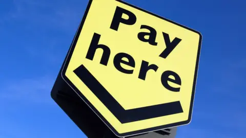 Pay here sign