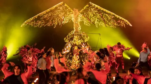 PA Media Carnival dancers performs on stage during The Awakening at Headingley Stadium in Leeds which celebrates the city's cultural past, present and future at the start of Leeds Year of Culture 2023