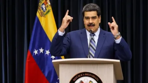 EPA Venezuelan President Nicolas Maduro delivers a press conference at the Simon Bolivar press room of the Miraflores Palace, in Caracas, Venezuela, 12 December 2018.