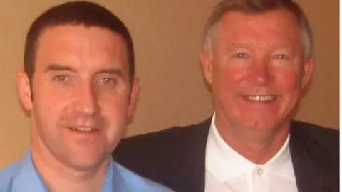 John Dempsey/Carryduff MUSC John White with former Manchester United manager Sir Alex Ferguson