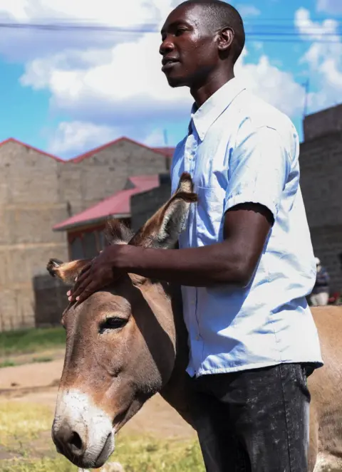 Brooke  Steve with his new donkey, Joy Lucky