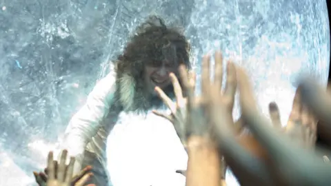 Getty Images Flaming Lips frontman Wayne Coyne heads out into the crowd in a giant zorb, at Primavera Sound festival Barcelona in 2011