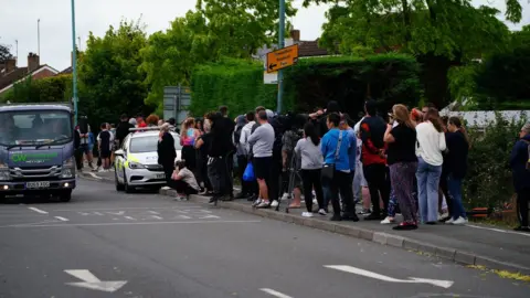 Ben Birchall Parents awaiting pupils leaving the Tewkesbury School