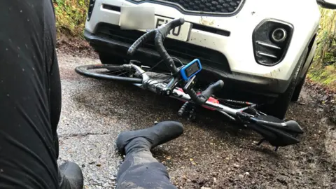 Jagdeep Singh Photo of Mr Singh's accident with his bike underneath a car