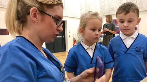 BBC Schoolchildren in miniature uniforms