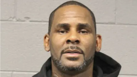 EPA R Kelly after arriving in court