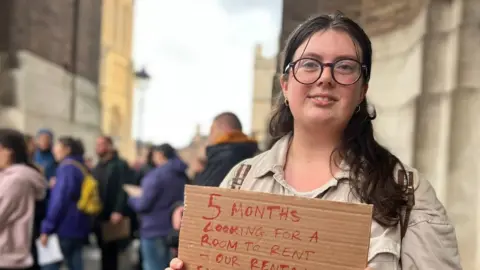 BBC Rowena Salmon holding message five months looking for a room to rent